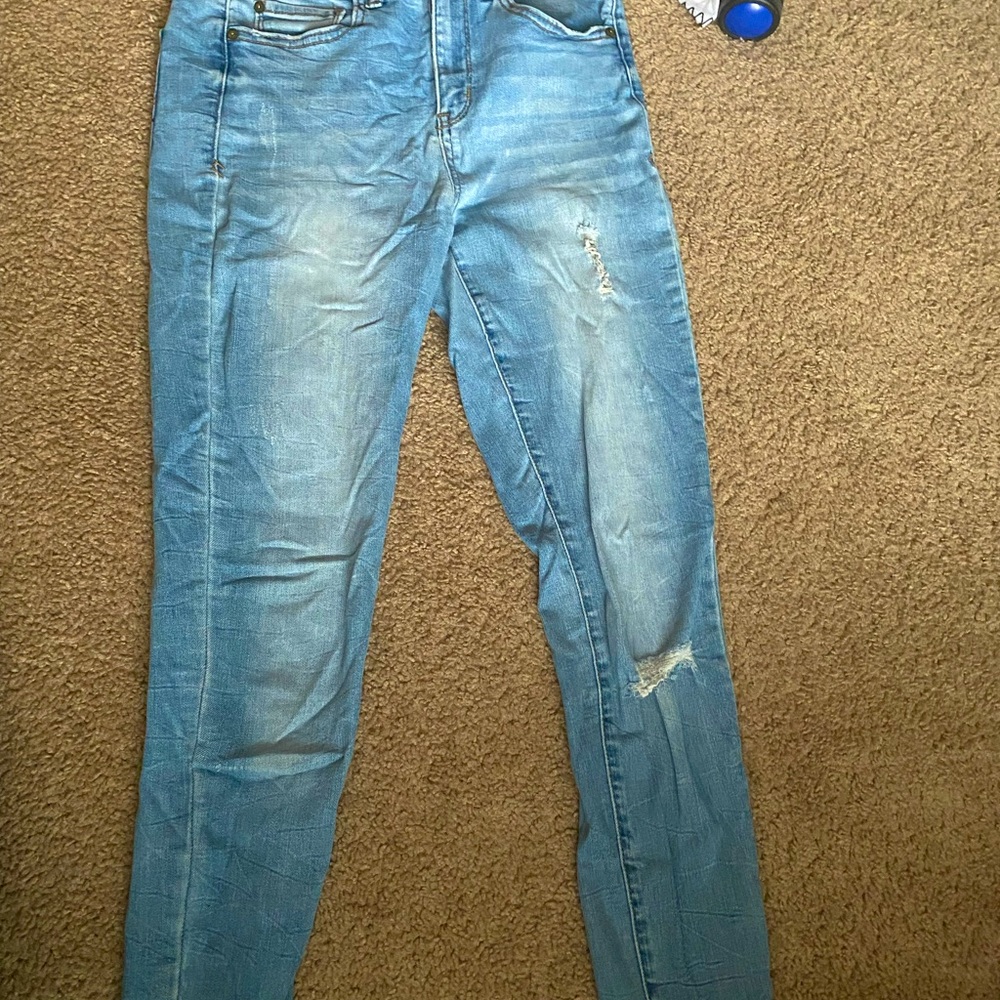 Light wash distressed jeans, size 6